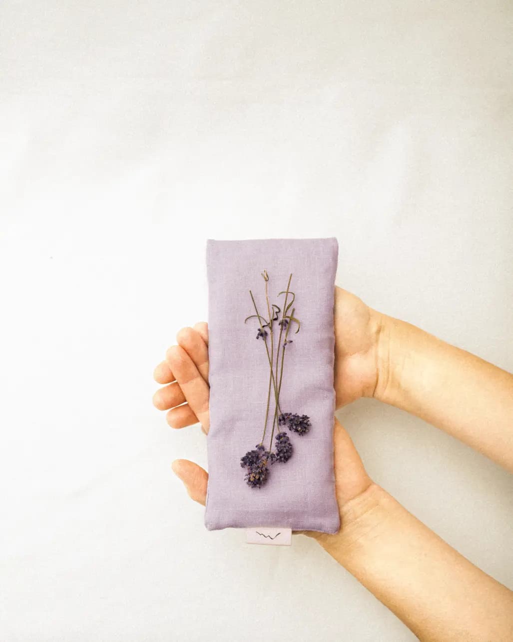 Nordic Soul eye pillow held in hands